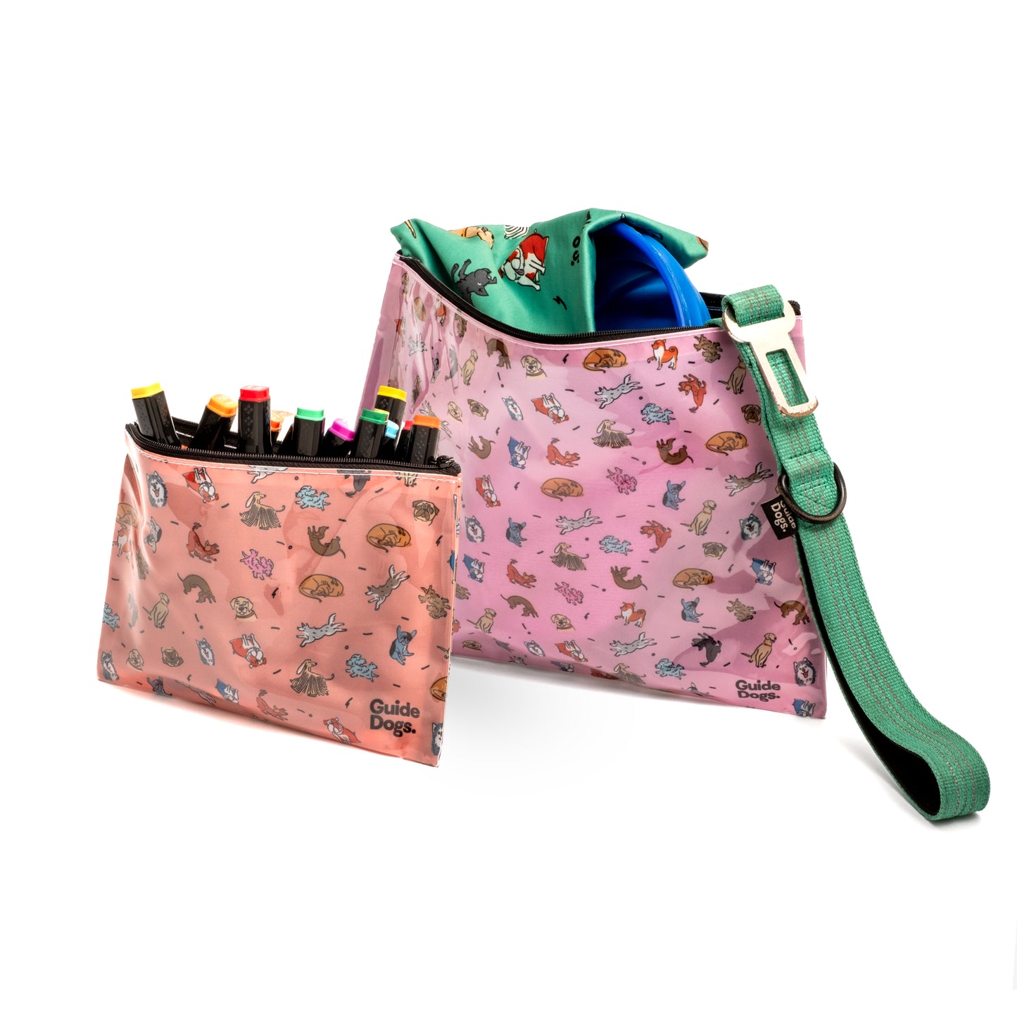 Image of two pouch zippered bags with dog prints; small apricot pouch is open with coloured textas poking out of the top. The larger pink pouch has a green dog lead spilling out.