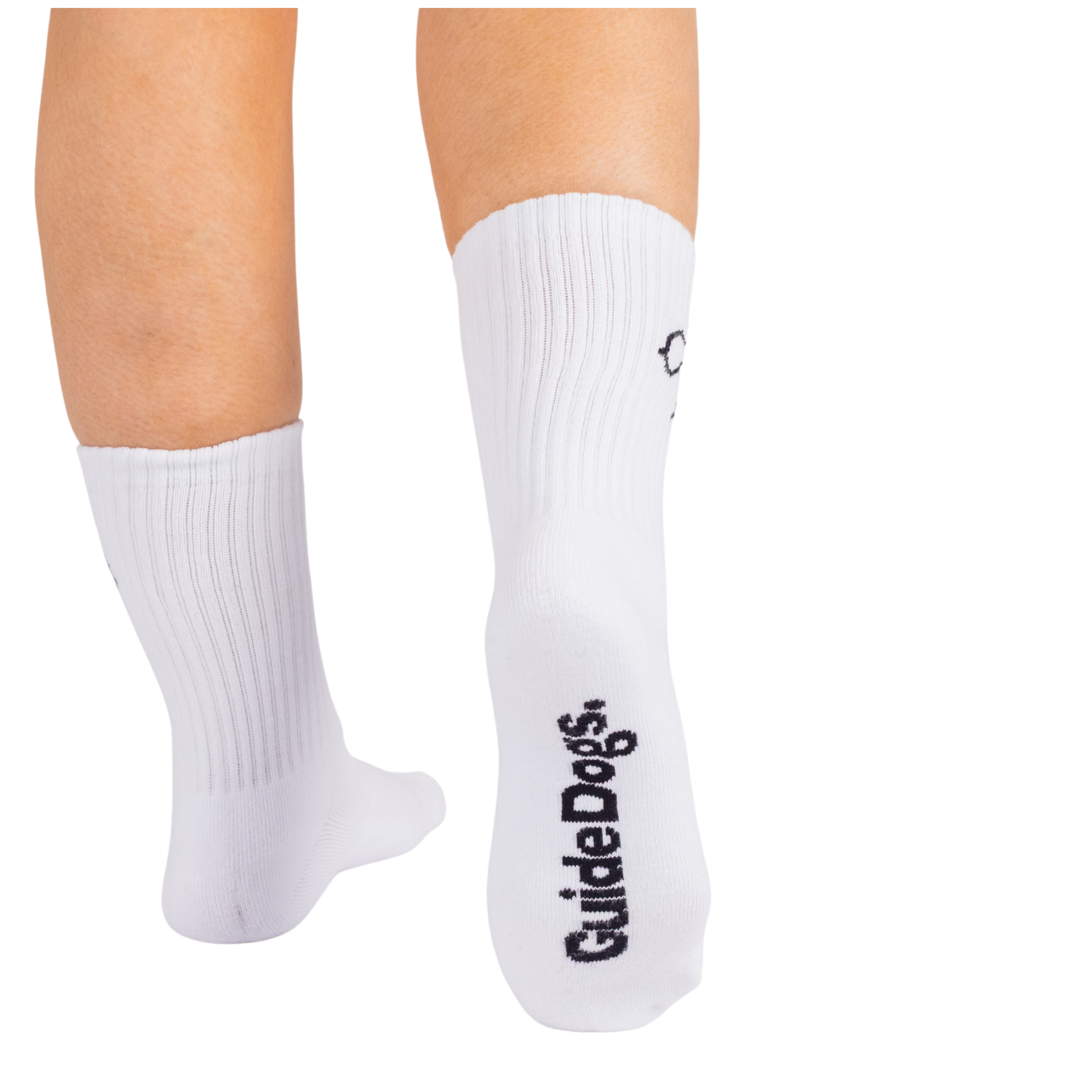 Image of a person wearing white crew socks. One sock shows a dog outline and "GuideDogs." printed on the sole in black.