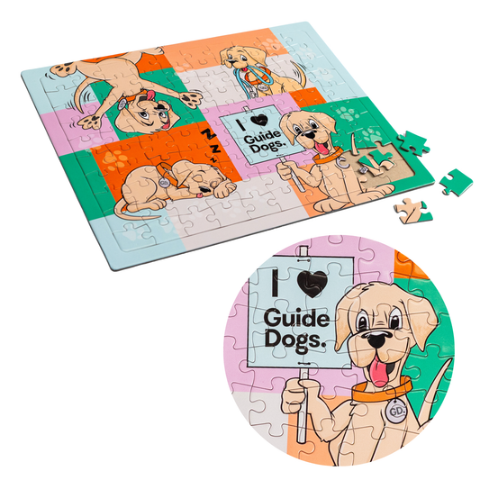 Image of a vibrant Jigsaw Puzzle features cartoon guide dog pups and a sign, with a few missing pieces.
