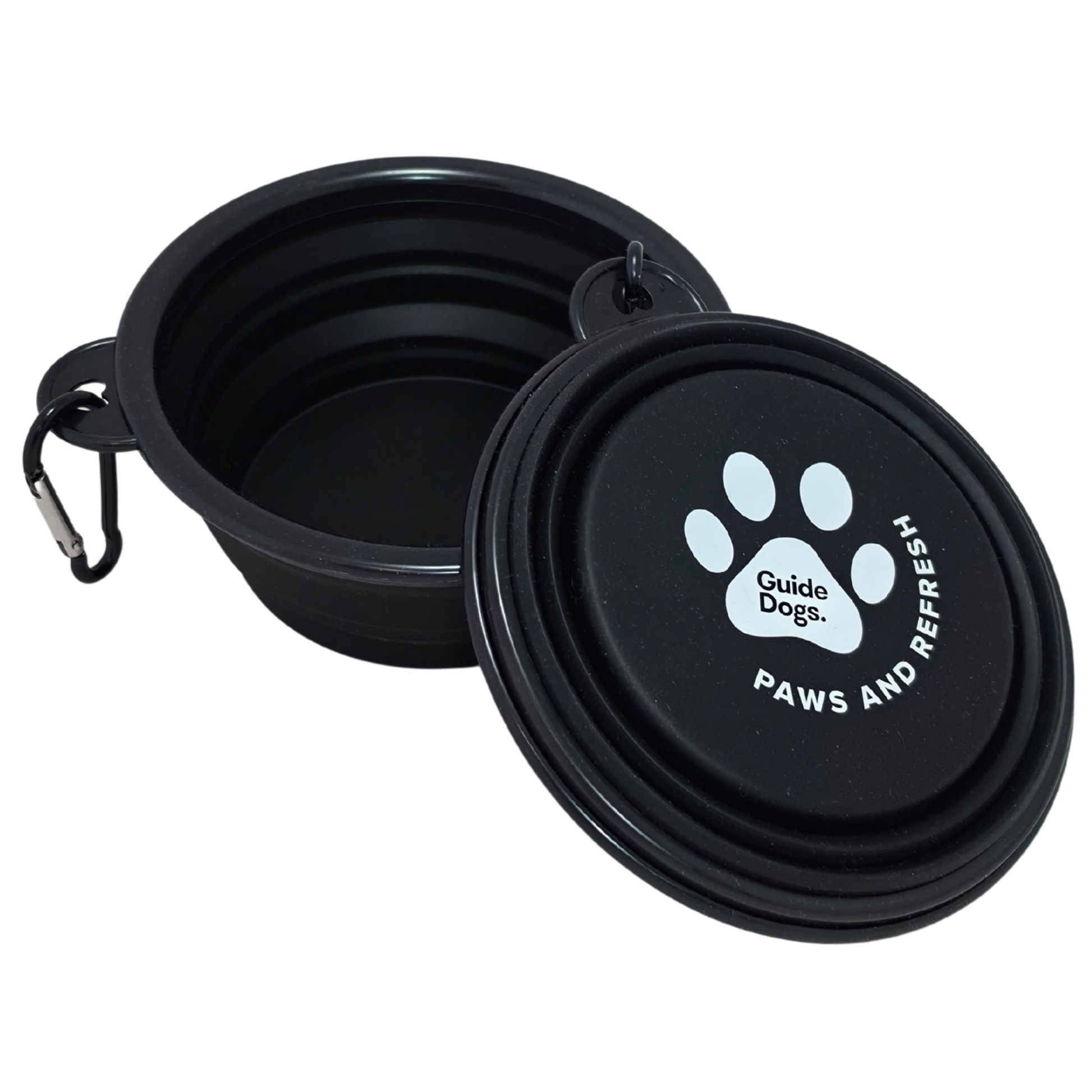 Image of a black collapsible pet water bowl with a collapsed bowl placed beside it on a white background. The collapsed bowl shows a white paw print logo with the text 'Guide Dogs' and 'PAWS AND REFRESH,' plus a small carabiner attached to the rim.