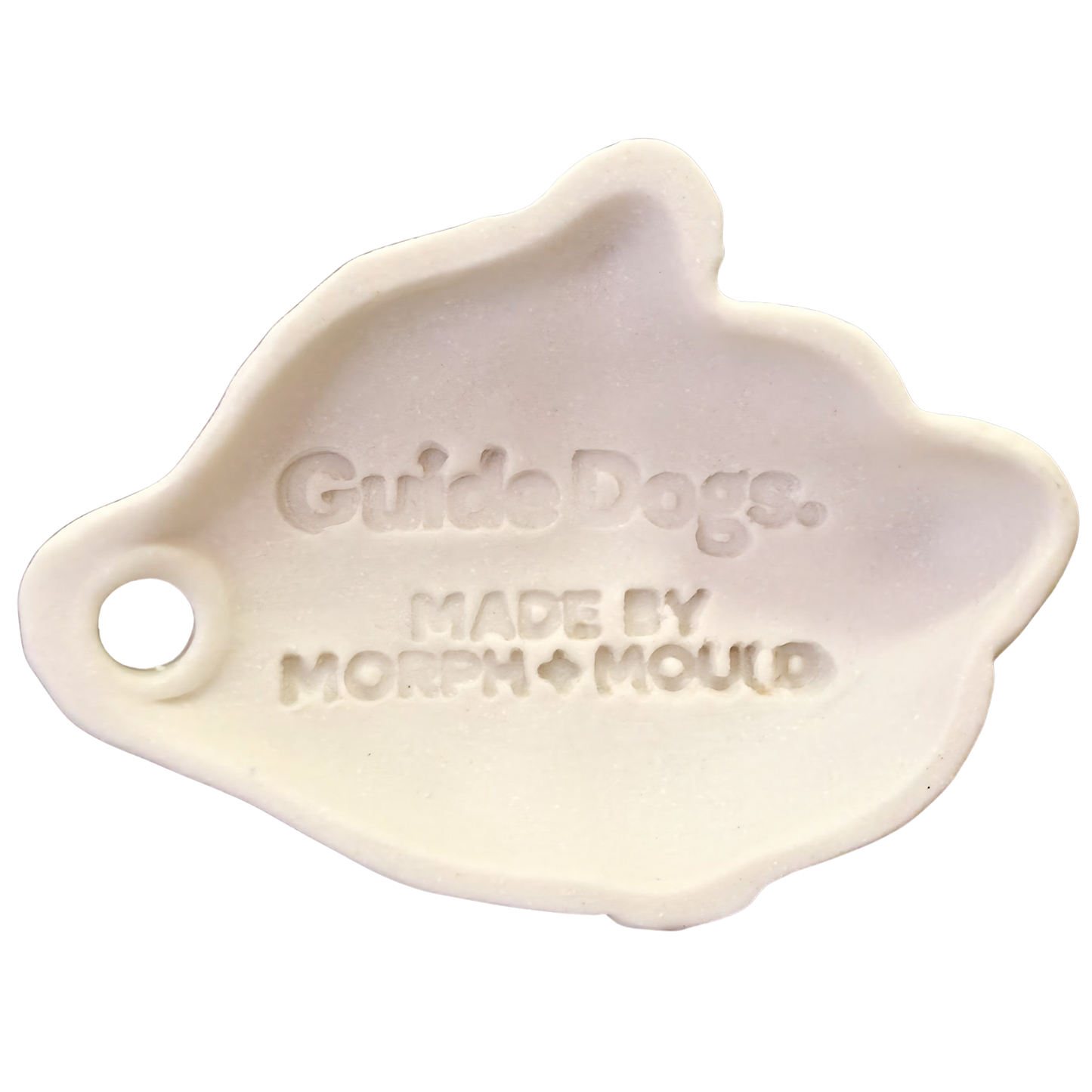 Image of Cream ceramic dog head ornament engraved Guide Dogs. Morph Mould’s Christmas Ornaments collection.
