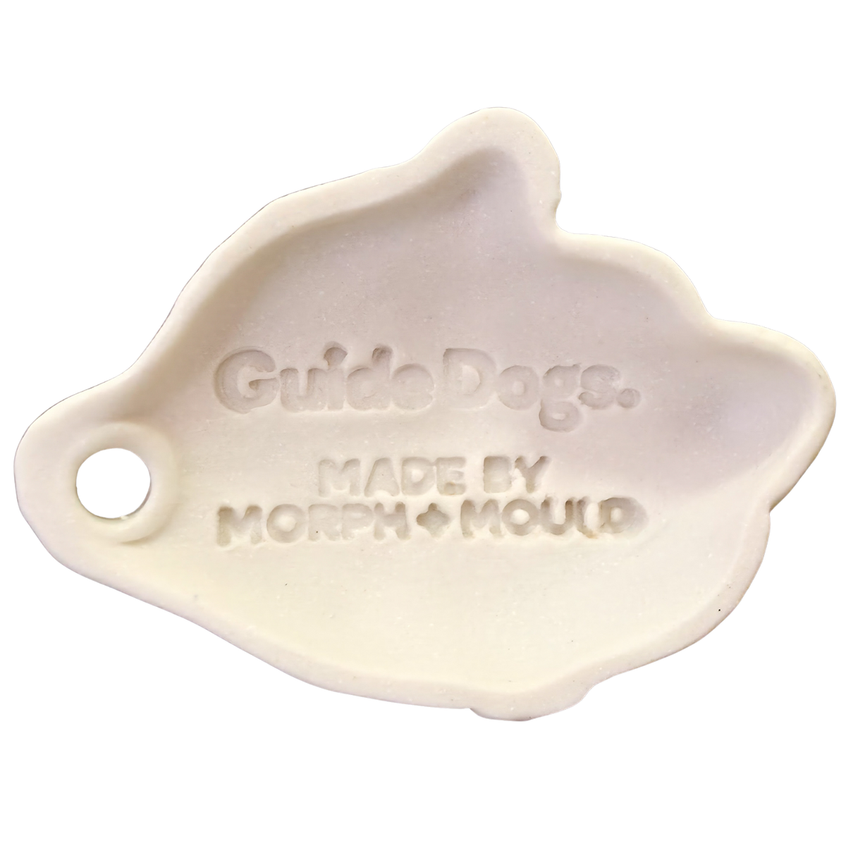 Image of Cream ceramic dog head ornament engraved Guide Dogs. Morph Mould’s Christmas Ornaments collection.