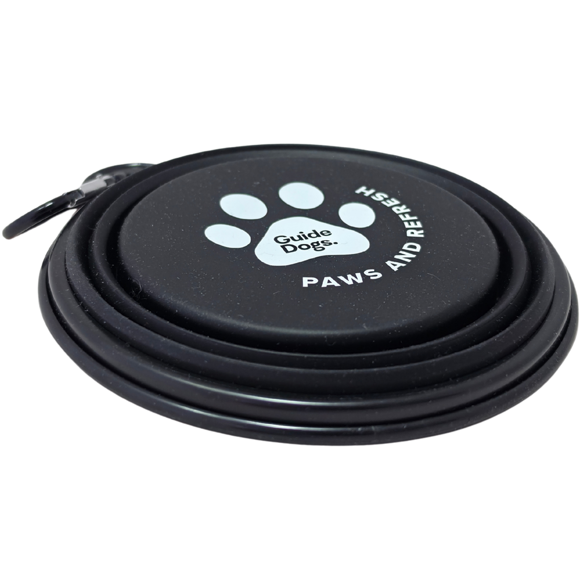 Image of a black collapsible dog water bowl with a carrying loop, featuring a white paw print logo and the text 'Guide Dogs' and 'PAWS AND REFRESH' on the base, shown on a white background.