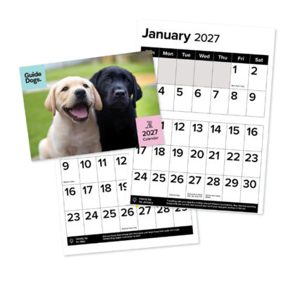 Image of three calendar pages fanned out on a white background. The top page shows a January 2027 calendar with a photo of two dogs and the title 'January 2027'.
