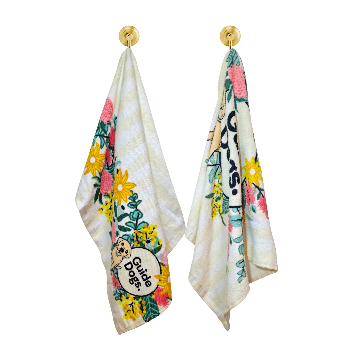 Image of two floral-themed towels with 'Guide Dogs' logo on a white background
