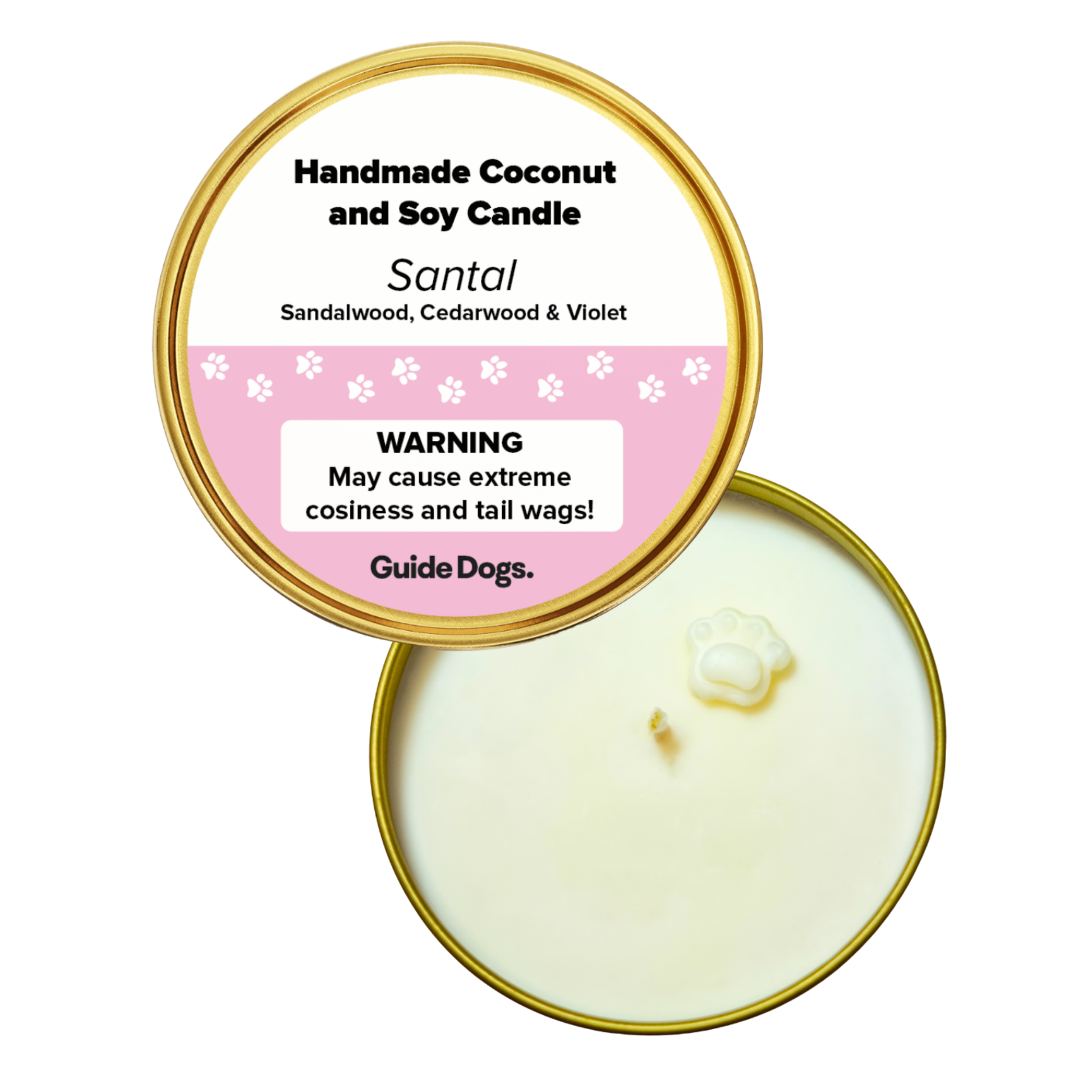 Image of top view of a gold candle tin  featuring a paw-shaped wax detail at the centre, a lid labeled “Santal” scent, and text 'Warning - May cause extreme cosiness and tail wags!
