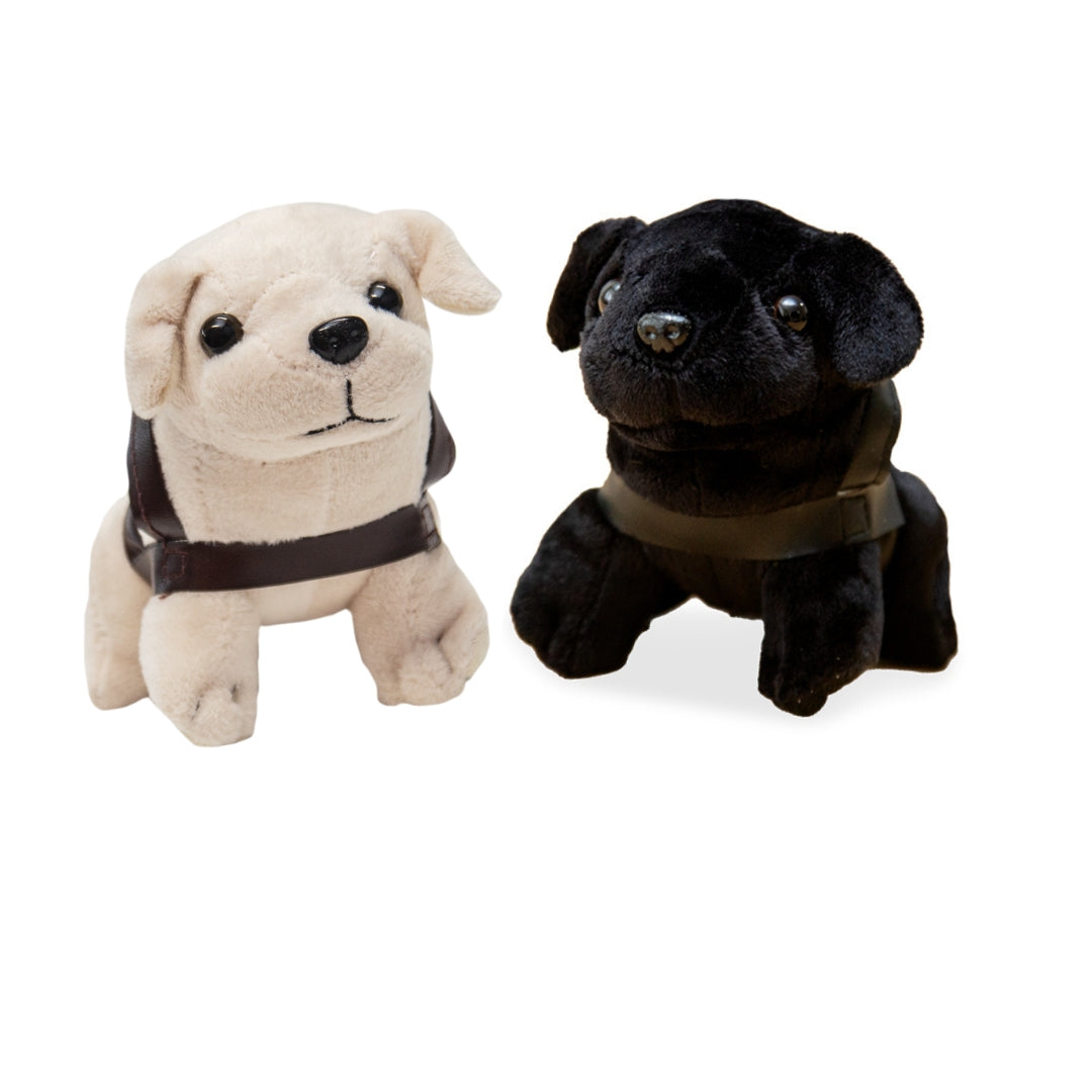 Image of two Mini Plush Dogs with a brown harness, one cream and one black, sitting side by side.