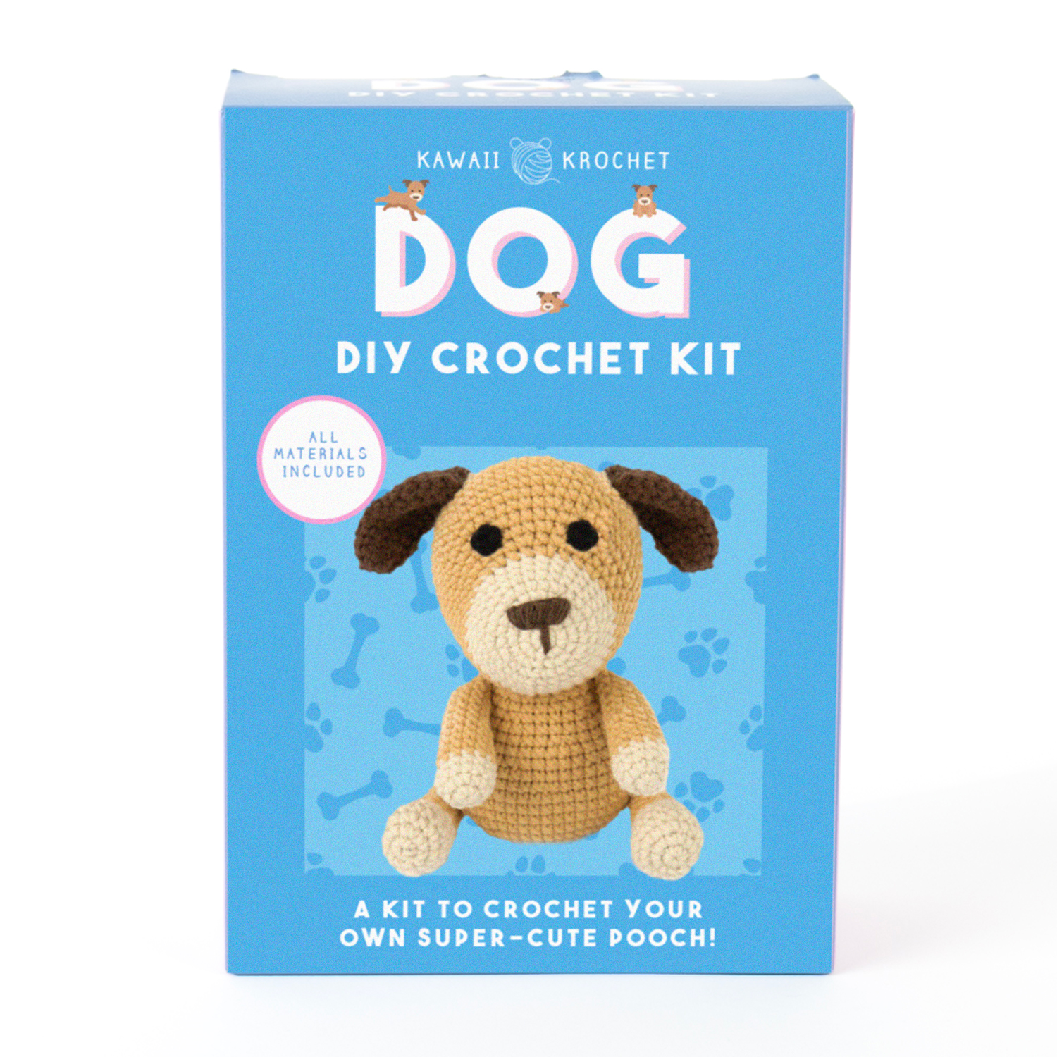Image of a blue box labeled "Crochet Kit" features a crocheted brown dog on the front. Ideal for beginner crochet enthusiasts, this kit includes all materials needed to crochet your own cute dog.