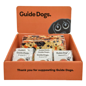 Image of Starter Fundraising Box with Guide Dogs text, filled with merchandise for Guide Dogs fundraising programs.