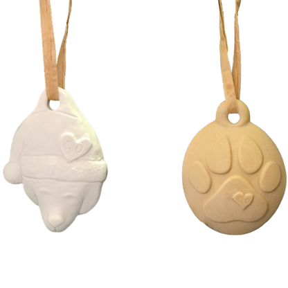 Image of Christmas Ornaments: Bear in Santa hat & paw print, both with hearts and ribbon loops.