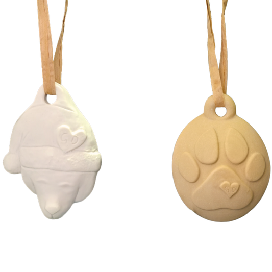 Image of Christmas Ornaments: Bear in Santa hat & paw print, both with hearts and ribbon loops.