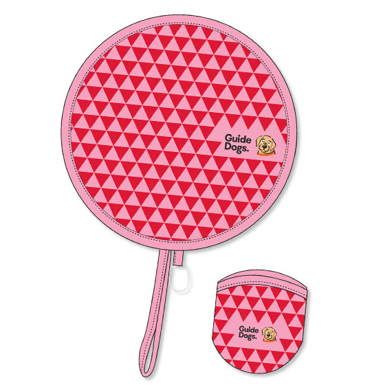 Image of Pink Twist Fan with red triangle pattern, Guide Dogs logo and text, shown with matching pink pouch.