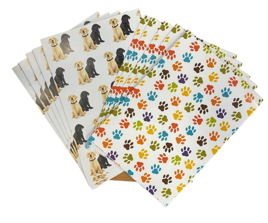 Image of Wrapping Paper: Puppies & Paws features black and gold dog design and multicoloured paw print design.
